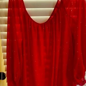 Beautiful vibrant red blouse with gold beads.